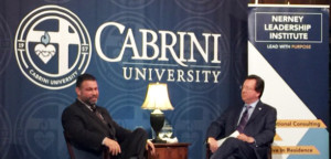 Cabrini VP of Institutional Advancement Steve Highsmith (r.) interviews PA Secretary of Education Pedro Rivera. 