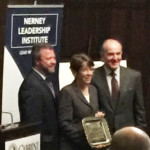 Cabrini University President Dr. Donald B. Taylor (l) and Tom Nerney, founder, Nerney Leadership Institute present the award to Sr. Mary