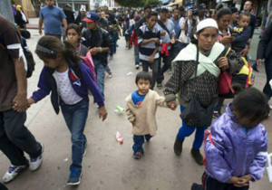 Immigrant children walk to the border