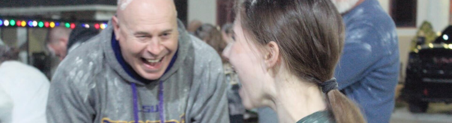 The traditional flour fight at CHS annual daughter-dad cookie bake Slide 6
